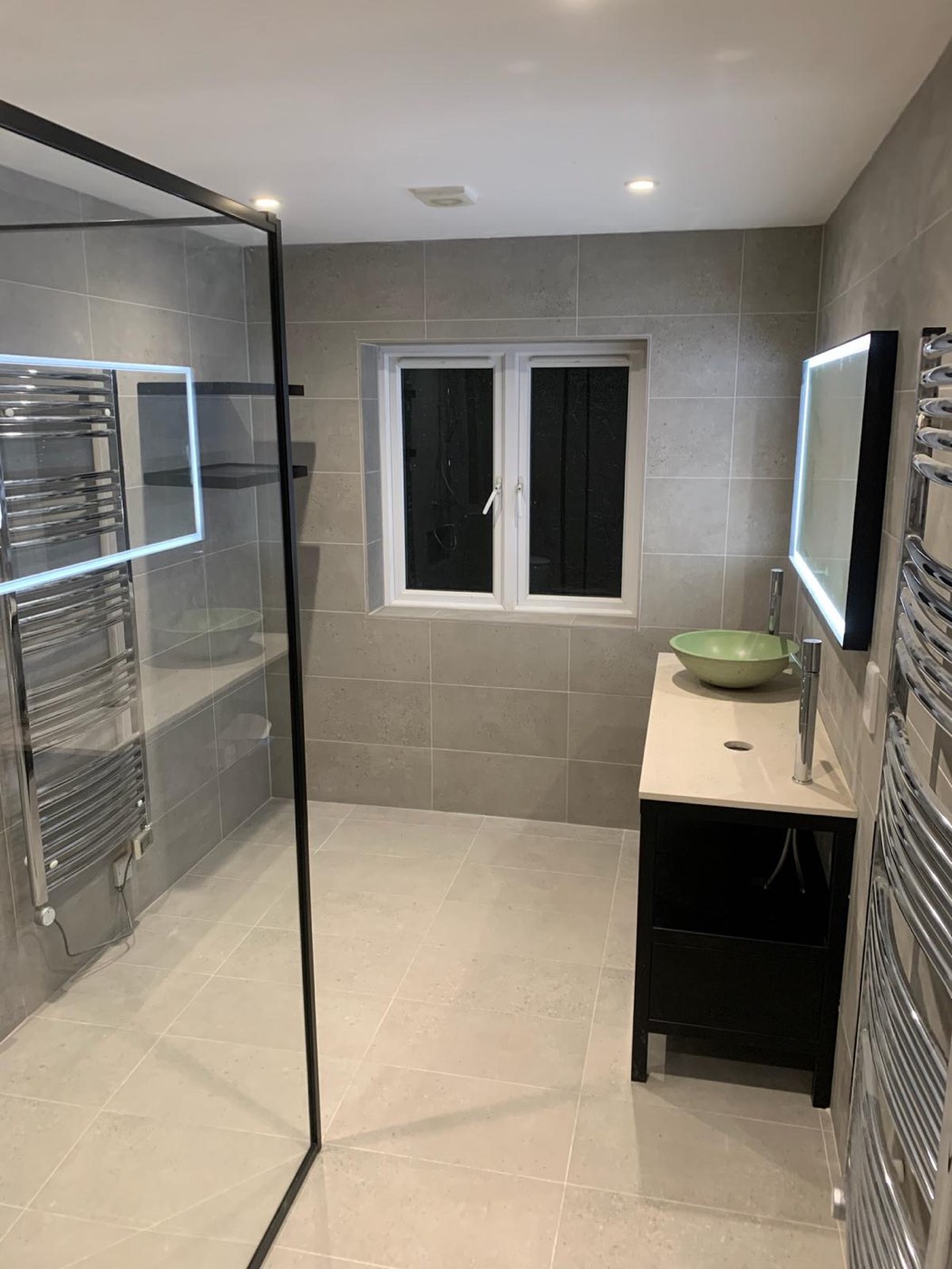 A walk-in shower room in large-format porcelain
